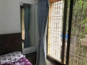 Room in 2.5 BHK Apartment at Kaviraj Apartment, Kandivali West – for Sale