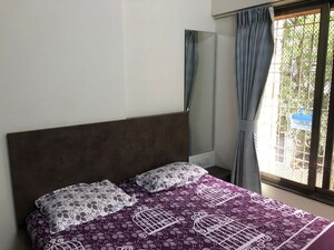 Bedroom in 2.5 BHK Apartment at Kaviraj Apartment, Kandivali West – for Sale