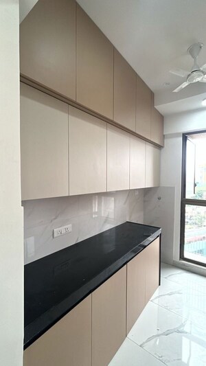 Kitchen in 1.5 BHK Apartment at Piramal Vaikunth, Balkum Pada – for Rent