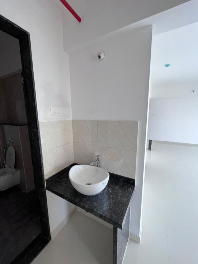 Bathroom, mantra-insignia 2 Bedroom 1100 Sq.Ft. Apartment In Mundhwa Pune 10699135