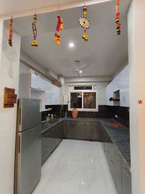 Kitchen in 3 BHK Apartment at Ansal API Esencia, Sector 67 – for Rent