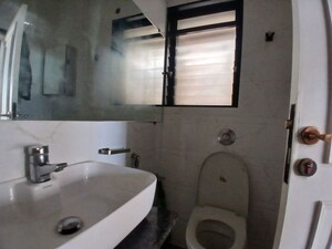 Bathroom in 2 BHK Apartment at Samartha Deep, Andheri West – for Sale