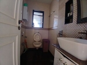 Bathroom in 2 BHK Apartment at Samartha Deep, Andheri West – for Sale