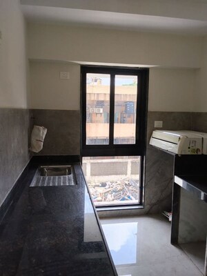 Kitchen in 1 BHK Apartment at Ajmera Boulevard, Malad West – for Rent