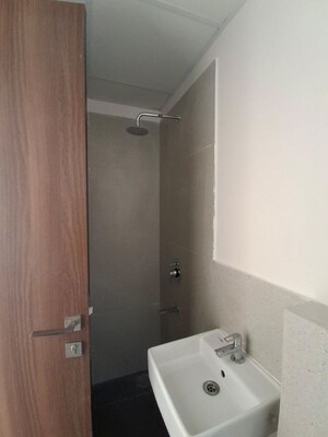 Bathroom in 1.5 BHK Apartment at Piramal Vaikunth, Balkum Pada – for Rent