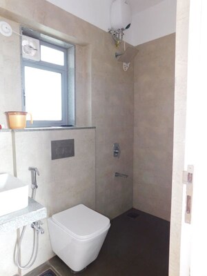 Bathroom in 2 BHK Apartment at Dynamix Avanya, Dahisar East – for Rent