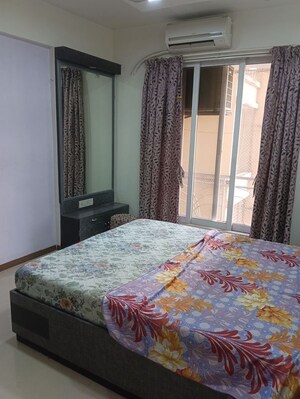 Bedroom in 2 BHK Apartment at Gemstar Symphony, Kandivali West – for Sale