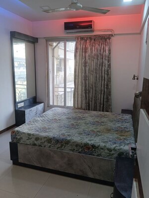 Bedroom in 2 BHK Apartment at Gemstar Symphony, Kandivali West – for Sale