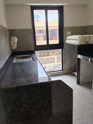 Kitchen in 1 BHK Apartment at Ajmera Boulevard, Malad West – for Rent