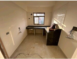Kitchen in 1 BHK Apartment at Gowda Palash, Malad West – for Sale
