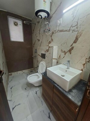 Bathroom in 2 BHK Builder Floor at Chattarpur – for Rent