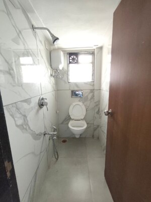 Bathroom in 1 BHK Apartment at RNA NG Diamond Hill, Beverly Park – for Rent