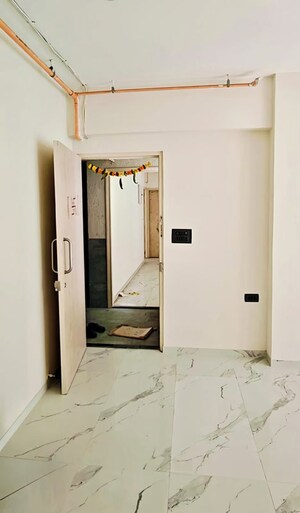 Bathroom in 2 BHK Apartment at Ruparel Sky Green, Kandivali West – for Rent