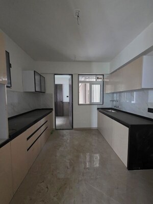 Kitchen in 4 BHK Apartment at Ambar Zenith, Viman Nagar – for Sale