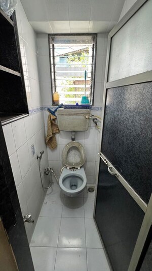 Bathroom in 1 BHK Apartment at Koteshwar Nagar CHS, Andheri East – for Rent