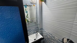 Bathroom in 1 BHK Apartment at Koteshwar Nagar CHS, Andheri East – for Rent