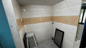 Bathroom in 1 BHK Apartment at Koteshwar Nagar CHS, Andheri East – for Rent