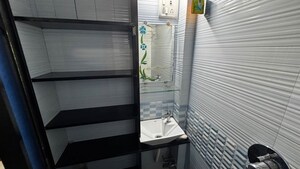 Bathroom in 1 BHK Apartment at Koteshwar Nagar CHS, Andheri East – for Rent