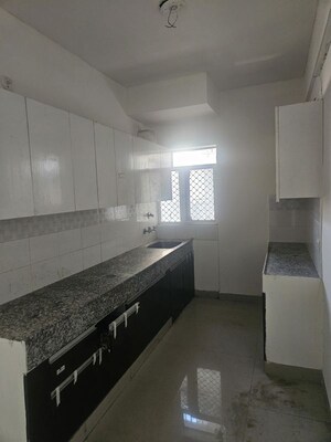 Kitchen in 2 BHK Apartment at Pareena Laxmi Apartments, Sector 99 – for Rent