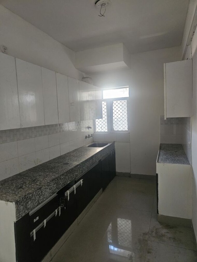 Kitchen, pareena-laxmi-apartments 2 Bedroom 453 Sq.Ft. Apartment In Sector 99 Gurgaon 10699531