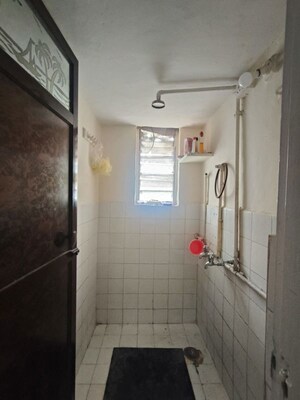 Bathroom in 1 BHK Apartment at Raheja Township, Malad East – for Rent
