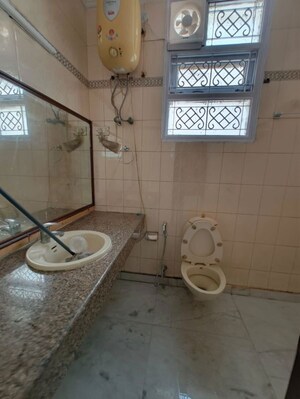 Bathroom in 3 BHK Builder Floor at Kalkaji – for Rent