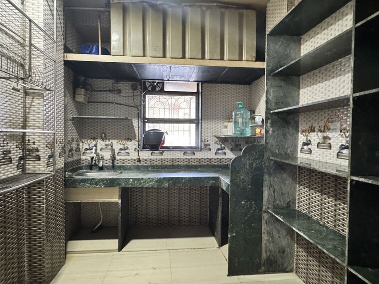 Kitchen, maruti-mahadev-nagar 1 Bedroom 550 Sq.Ft. Apartment In Sunil Nagar Thane 10699711