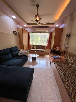 Living Room in 1 BHK Apartment at Carter Apartments, Bandra West – for Rent