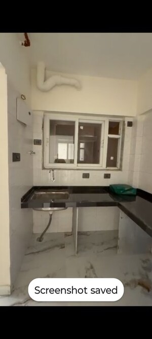 Kitchen in 1 BHK Apartment at Ruparel Crest, Kurla East – for Rent