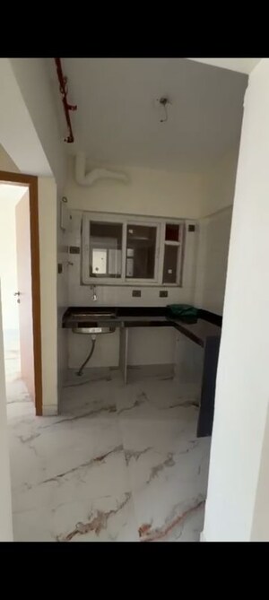 Kitchen in 1 BHK Apartment at Ruparel Crest, Kurla East – for Rent