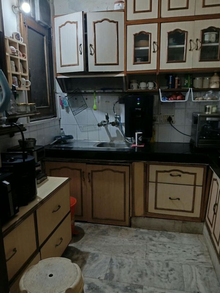Kitchen, chittaranjan park 3 Bedroom 160 Sq.Yd. Builder Floor In Chittaranjan Park Delhi 10700013