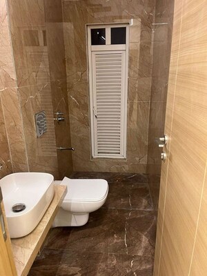 Bathroom in 2 BHK Apartment at Ruparel Iris, Matunga West – for Sale