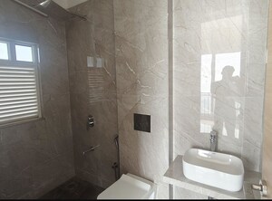 Bathroom in 2 BHK Apartment at Ruparel Iris, Matunga West – for Sale