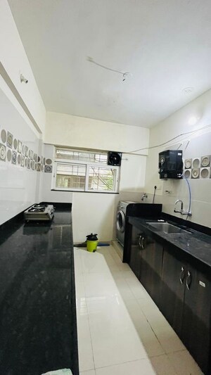 Kitchen in 2 BHK Apartment at Karan Manor, Baner – for Rent