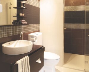 Bathroom in 3 BHK Apartment at Ruparel Iris, Matunga West – for Sale