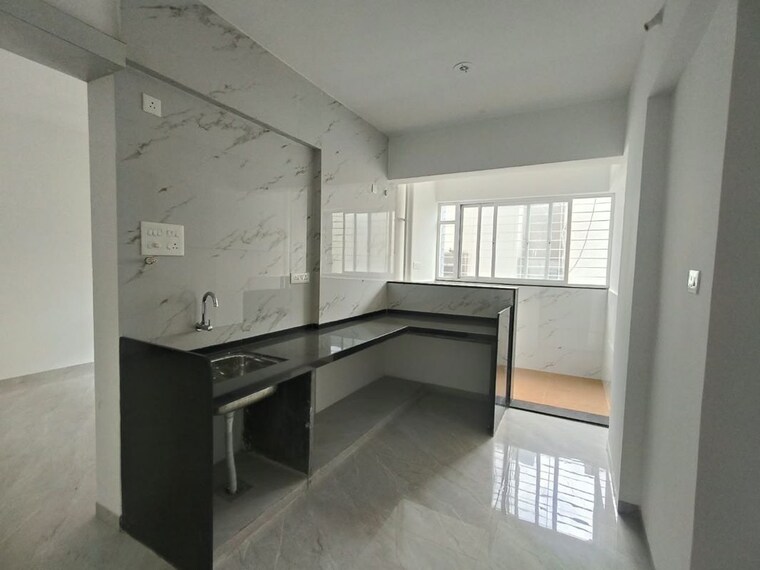 Kitchen, griad-nest 2 Bedroom 800 Sq.Ft. Apartment In Baner Pune 10700087
