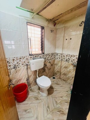 Bathroom in 2 BHK Apartment at Dhanlaxmi Park, Kothrud – for Rent