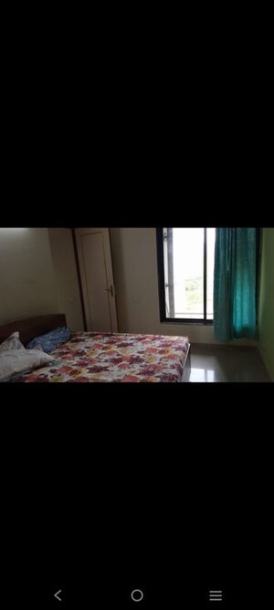 Bedroom in 2 BHK Apartment at Ganesh Malabar County, Near Nirma University On Sg Highway – for Rent