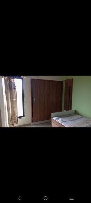 Bedroom in 2 BHK Apartment at Ganesh Malabar County, Near Nirma University On Sg Highway – for Rent