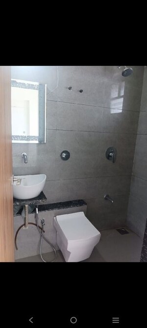 Bathroom in 3 BHK Apartment at Gunatit Antilia One, Ghatlodia – for Rent
