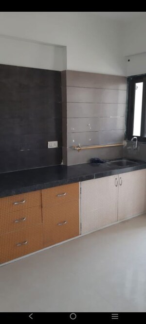 Kitchen in 2 BHK Apartment at Goyal Orchid Greenfield, Bopal – for Rent