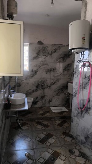 Bathroom in 3 BHK Builder Floor at Cosmos Greens, Alwar Bypass Road – for Sale