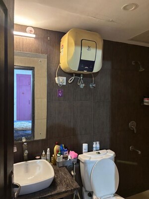Bathroom in 3.5 BHK Apartment at Antriksh Golf View, Sector 78 – for Rent