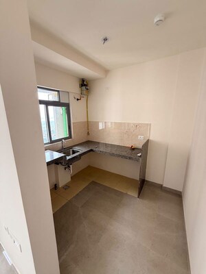 Kitchen in 1 BHK Apartment at Piramal Vaikunth, Balkum Pada – for Rent