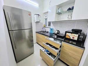 Kitchen in 1 BHK Apartment at Omkar Signet, Malad East – for Rent