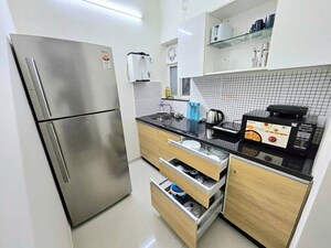 Team Area in 1 BHK Apartment at Omkar Signet, Malad East – for Rent
