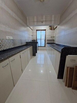 Kitchen in 2 BHK Apartment at Sheth Auris Bliss, Malad West – for Rent