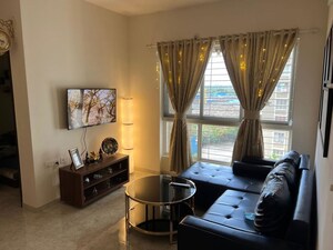 Living Room in 2 BHK Apartment at Lodha Amara, Kolshet Road – for Sale