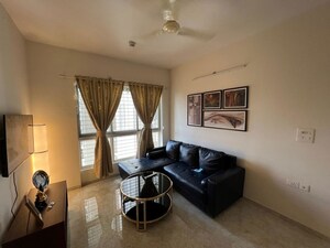 Living Room in 2 BHK Apartment at Lodha Amara, Kolshet Road – for Sale