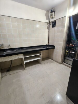 Kitchen in 2 BHK Apartment at Mit Villa, Vashi Sector 12 – for Sale